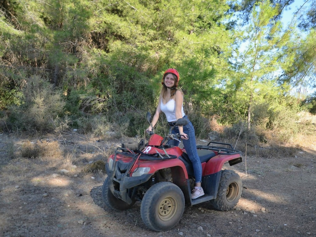 Rider on red quad bike on Alanya dirt track
