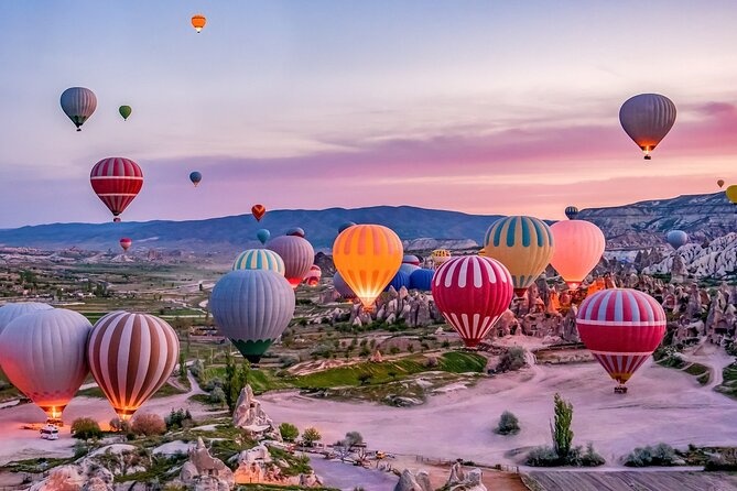 Colorful hot air balloons over Cappadocia at sunrise
